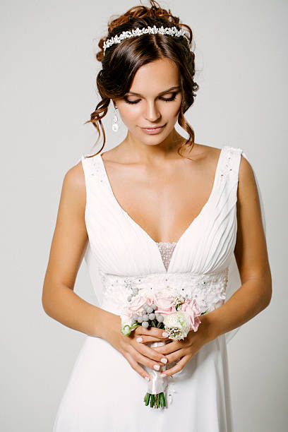 istock Studio shot of young beautiful bride 525628857