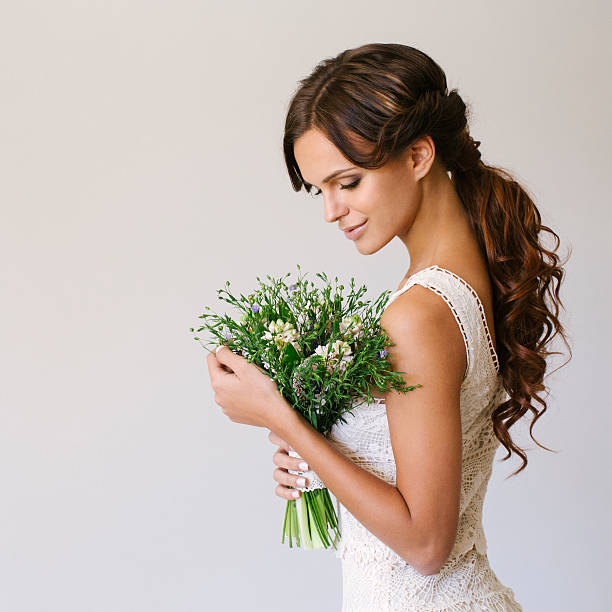 istock Studio shot of young beautiful bride 525628929