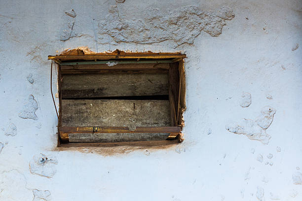 Hole for hangs air conditioner machine outside of window. stock photo