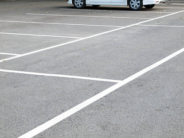 istock Parking lane outdoor in public park 525635725