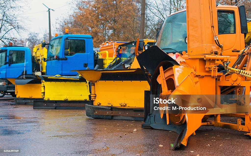 Road services are ready for winter. Winter service vehicles. Backhoe Stock Photo