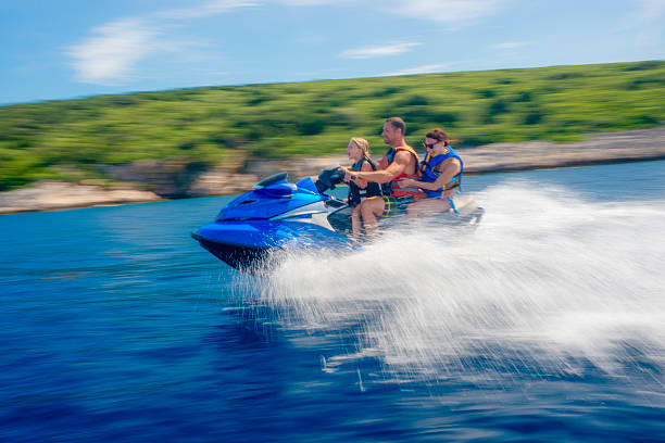 istock Family Riding a Jet Boat 525643093
