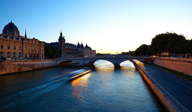 istock The River Seine And Paris By Night 525648569