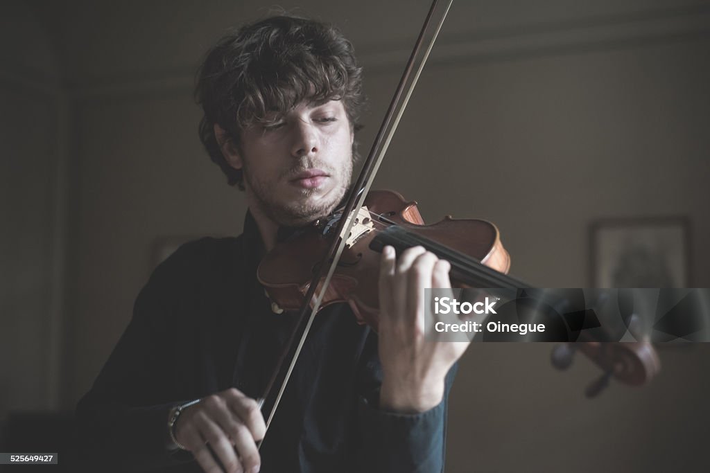 young handsome blonde violinist young handsome blonde italian violinist Adult Stock Photo