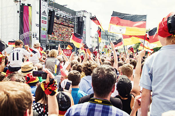 German soccer fans celebrating winning of World Cup in Berlin. Berlin, Germany - July 15, 2014: The German national team won 2014 the FIFA World Cup and celebrated this with their fans in Berlin. 2014 stock pictures, royalty-free photos & images