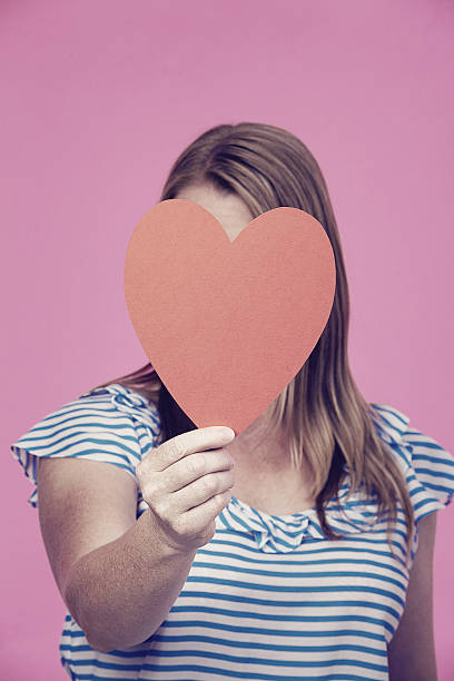 istock Girl with Heart 525651159