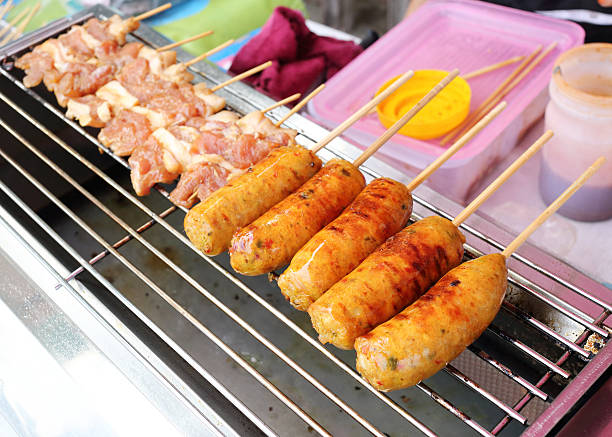 istock grilled pork and sausage 525653251