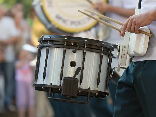 Drummer in a Marching Band. Drummers playing snare drums in parade