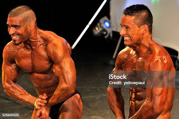 Male Bodybuilding Contestant Showing His Chest Pose Stock Photo - Download Image Now