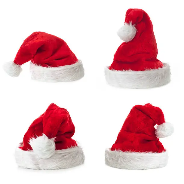 Four Santa Claus hat on white background.