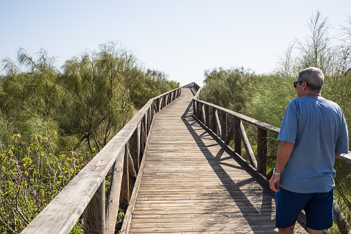 Wooden walkway to the beach in Spain, Punta del Moral, Ayamonte, Andalusia