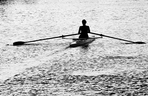 istock Female lonely rower on a river in Madrid 525689121