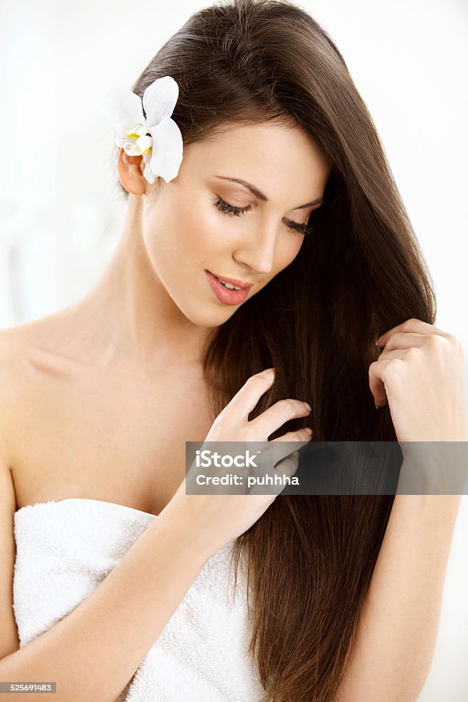 Beautiful Brunette Woman Portrait with Long Hair. Beautiful Brunette Woman Portrait with Long Hair.Smiling Girl Isolated on a White Background.Haircare .Spa.Beauty Model Adult Stock Photo