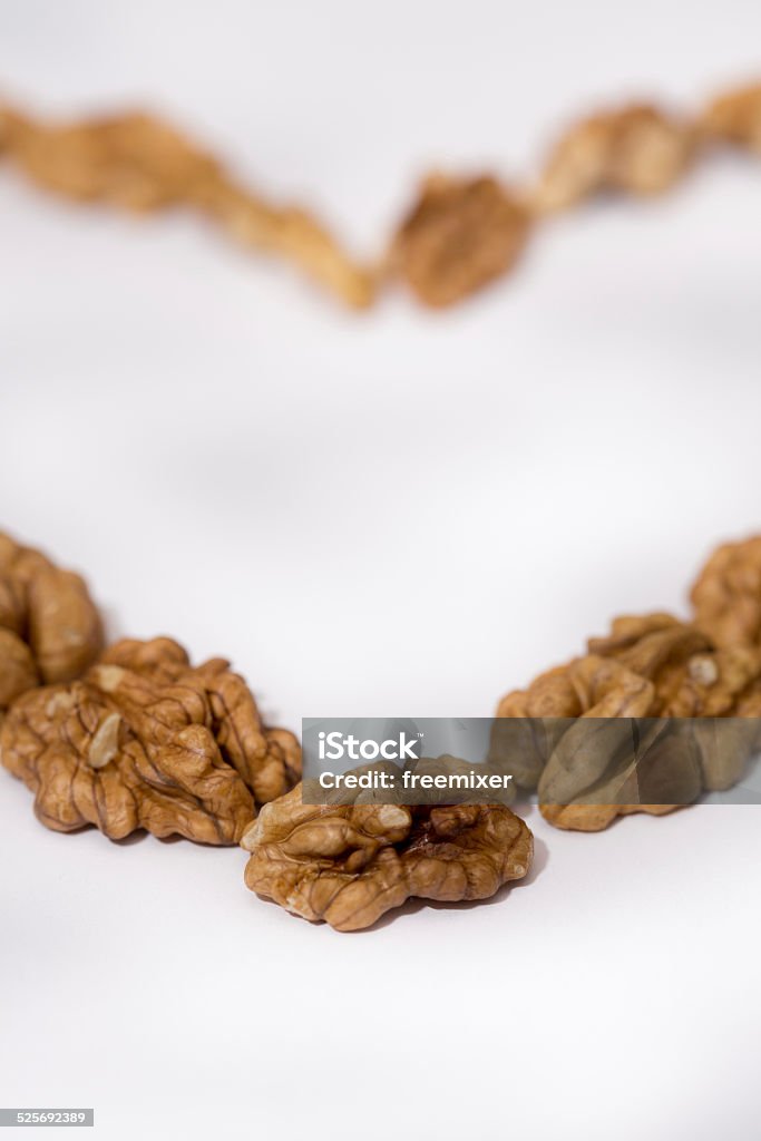 Heart made of nuts Brown Stock Photo