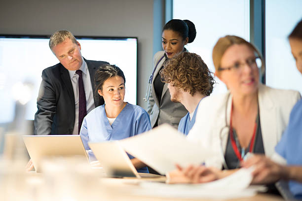istock medical sales team assist 525695327