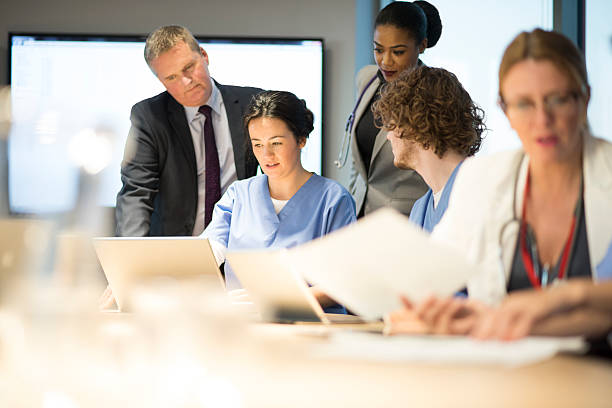 istock hospital team meeting 525695397