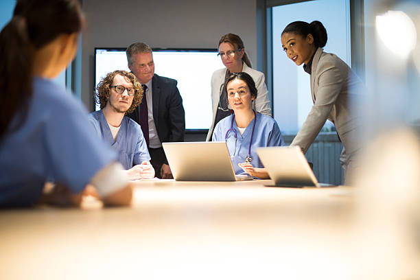 istock business and medicine working together 525696529