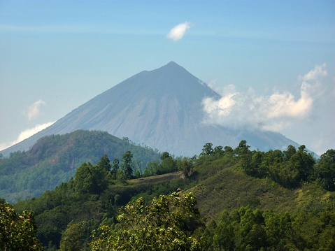 Inerie volcano perfect pyramid shape. It's a 2245 meters high volcano located close to the town of Bajawa, Flores island