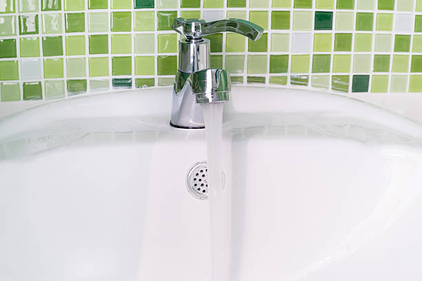 istock white sink washbasin and silver faucet 525696755
