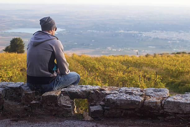 istock Man enjoying countryside view on sunset 525713535