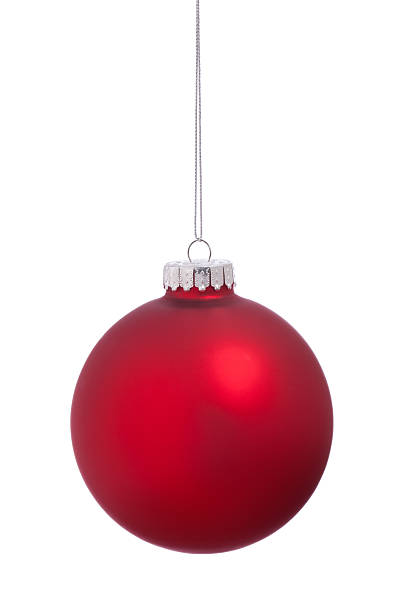 istock Christmas holiday red tree ornament bauble isolated on white 525715881