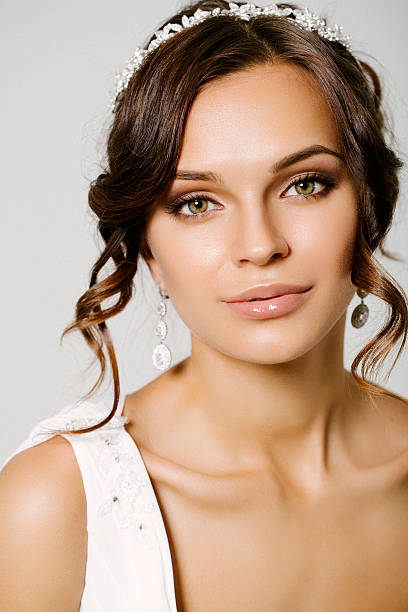 istock Studio shot of young beautiful bride 525717975