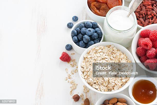 Cereal And Various Delicious Ingredients For Breakfast Stock Photo - Download Image Now