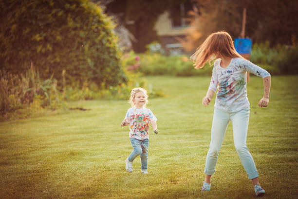 istock Mother and little daughter playing together 525726658