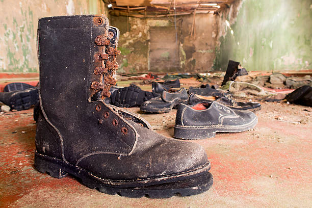 istock Military footwear in abandoned artillery. 525728412