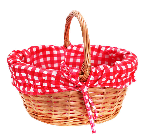 istock Lovely wicker basket with red white plaid lining 525730500