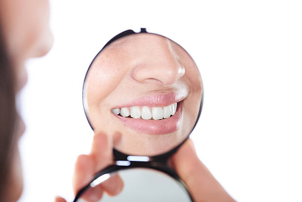 istock reflection on girl smile 525730684