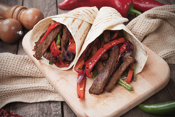 istock Mexican fajitas in tortilla wrap 525731966