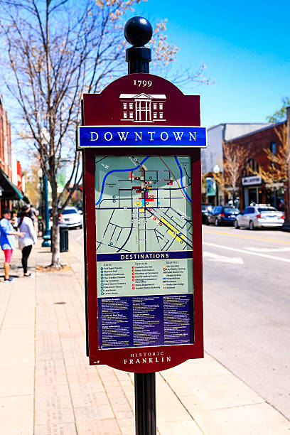 Tourist information map on the sidewalk in downtown Franklin, Tennessee. Franklin, TN, USA - April 4, 2016: Tourist information map on the sidewalk in downtown Franklin, Tennessee, tennessee road sign stock pictures, royalty-free photos & images