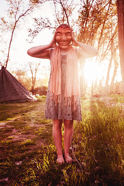 istock Woman Holding Sculpted Mask 525733942