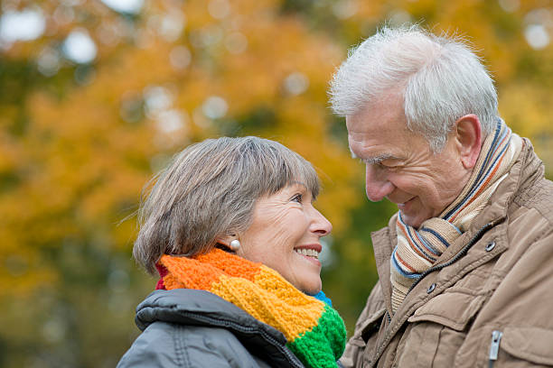 istock Happy smiling Senior couple outdoors in autumn 525735463