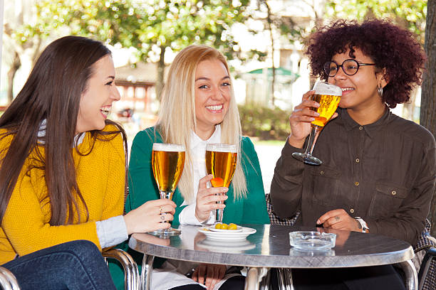istock girlfriends in the city having drinks 525735684