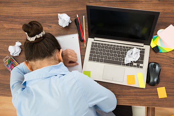 istock Businesswoman Doing Head Down On Desk 525736688