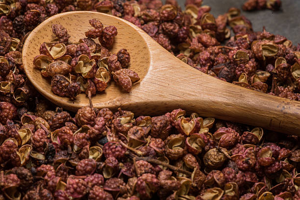 istock Wooden Spoon in Szechuan Peppercorns 525737032