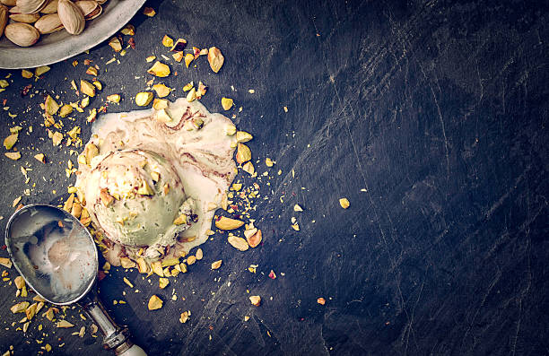 istock Delicious Pistachio Ice Cream on a Background 525737244
