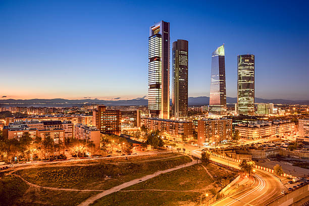 Madrid, Spain Financial District Madrid, Spain financial district skyline at twilight. madrid city view stock pictures, royalty-free photos & images