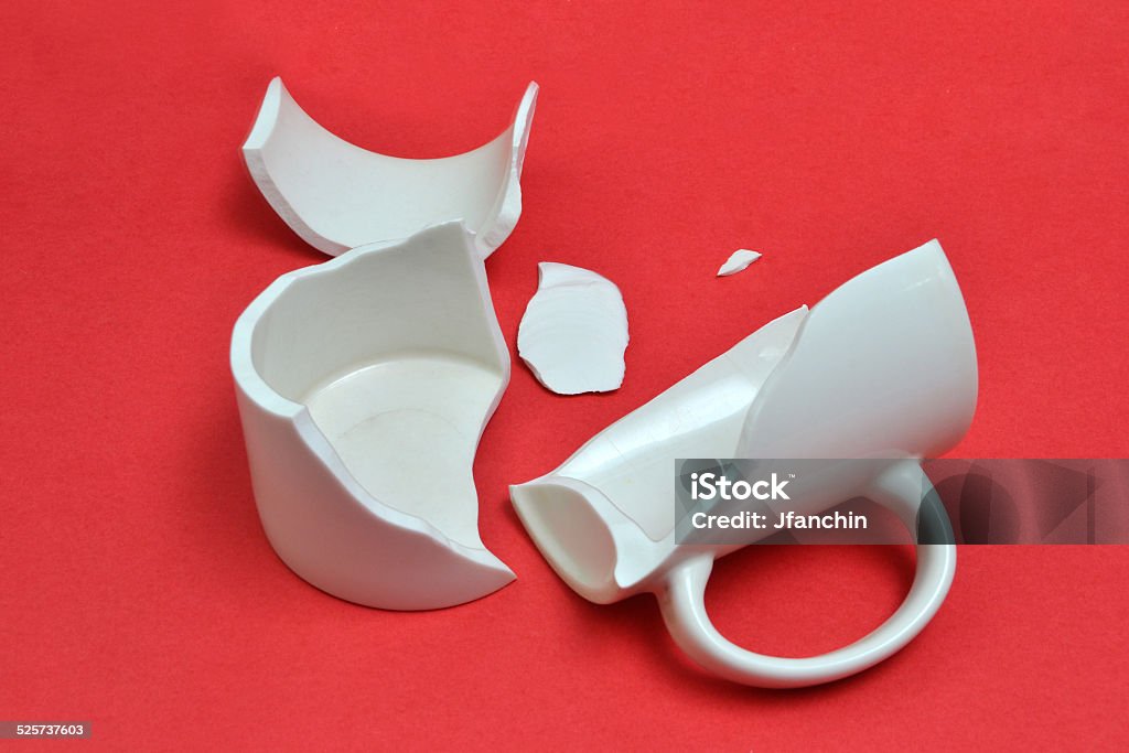 broken mug/cup broken cup/mug on bright background Broken Stock Photo