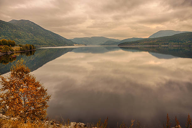 istock Kroderen lake on Hallingdal river in Buskerud, Norway at sunset 525737739