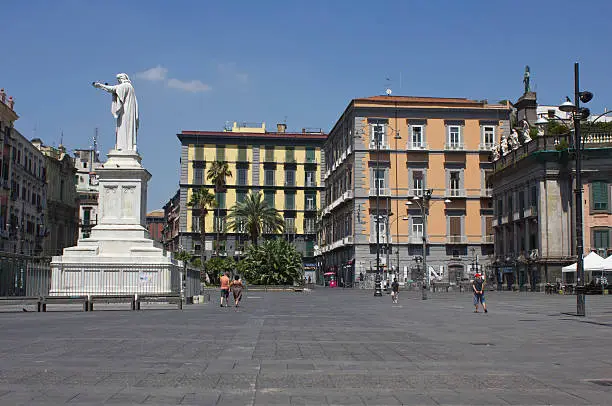 Naples, Italy: Piazza Dante, a large public square named after the poet Dante Alighieri. The square is dominated by a 19th-century statue of the poet Dante, sculpted by Tito Angelini.
