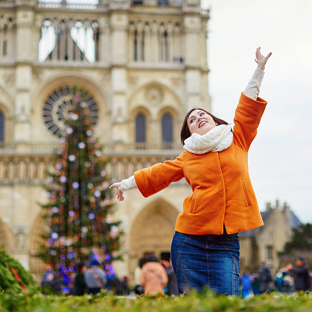 istock Happy young tourist in Paris on a winter day 525737796
