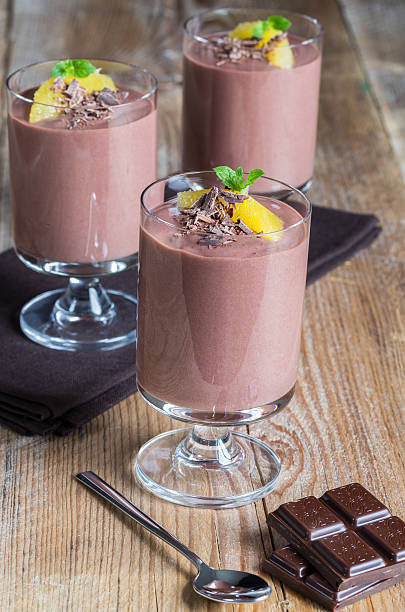 istock Chocolate pudding dessert with orange and grated chocolate 525739205