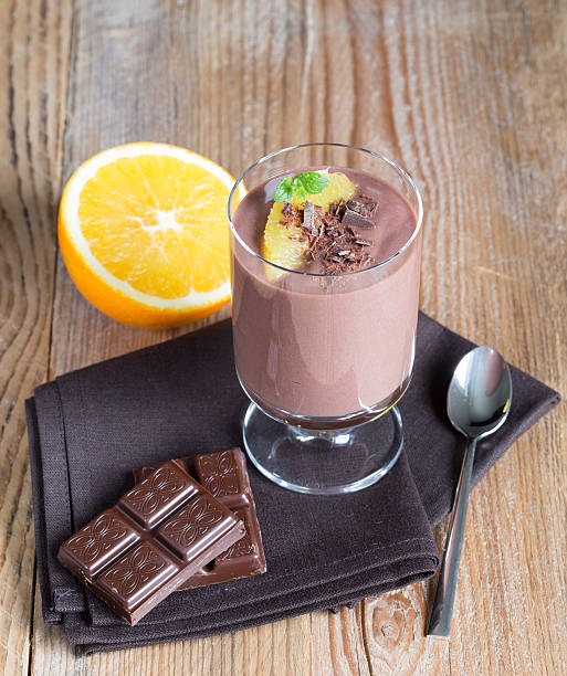 istock Chocolate pudding dessert with orange and grated chocolate 525739207