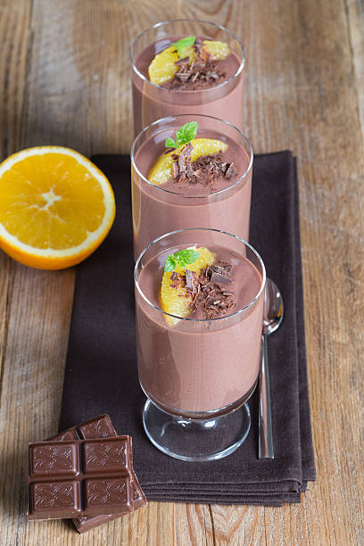 istock Chocolate pudding dessert with orange and grated chocolate 525739635