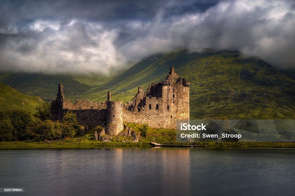 Kilchurn Castle Kilchurn Castle reflections in morning light,, Highlands, Scotland Castle Stock Photo