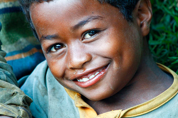 istock Smiling cute african boy with beautiful face - Madagascar 525739917