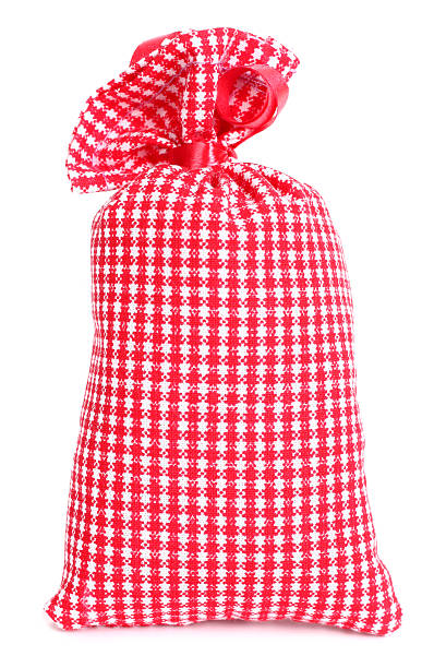 istock Gift lavender sack plaid cloth bag with red bow 525740100